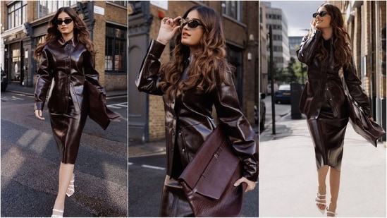 Rasha Thadani proves her fashionista status with her latest look, sporting a chic brown leather dress paired with a chic handbag, white strappy heels and black sunglasses. (Instagram)