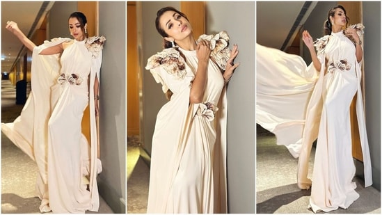 Malaika Arora is a vision in white in her latest look, which includes a stunning gown adorned with delicate floral embellishments. (Instagram)