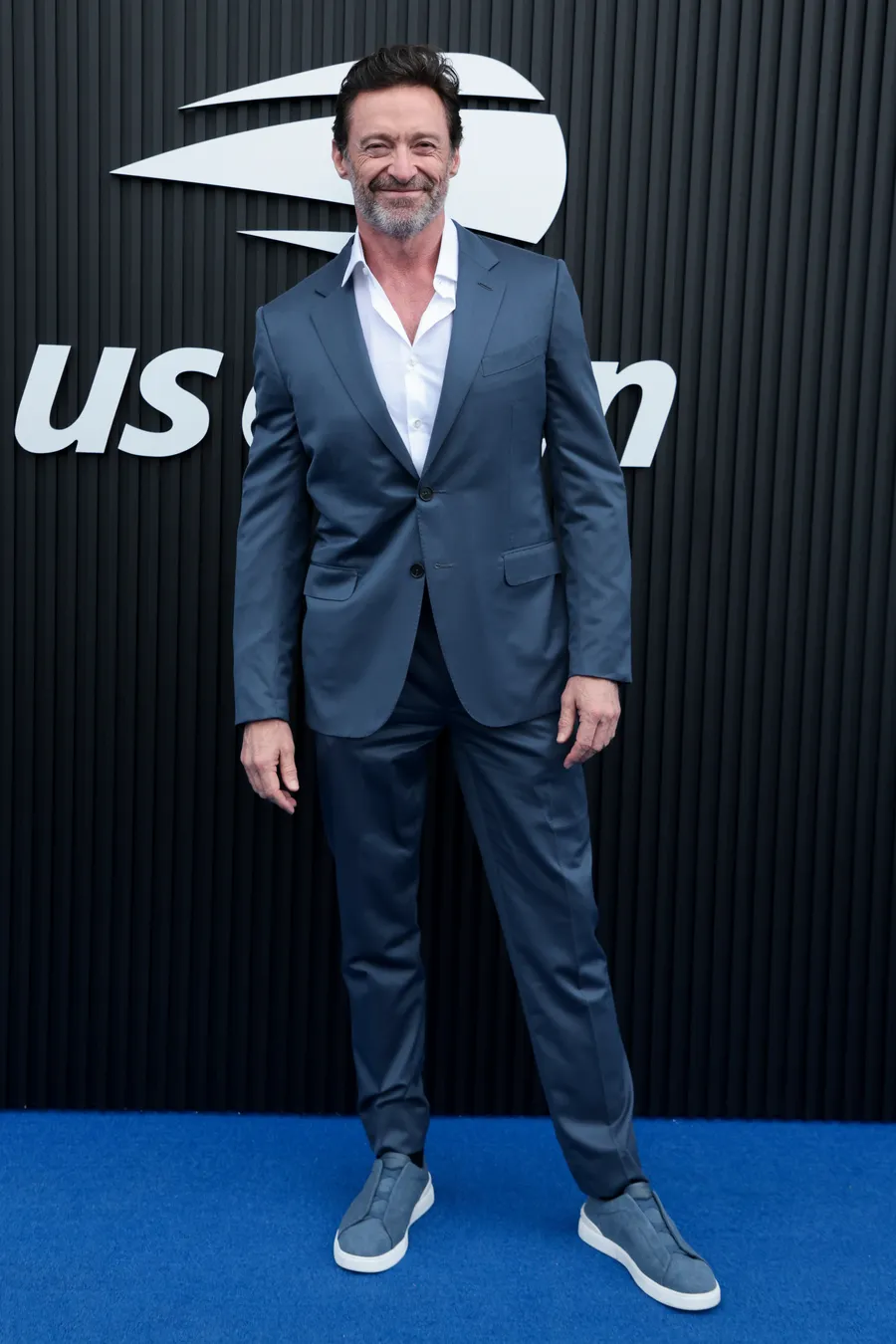 Hugh Jackman opted for an elegant blue suit