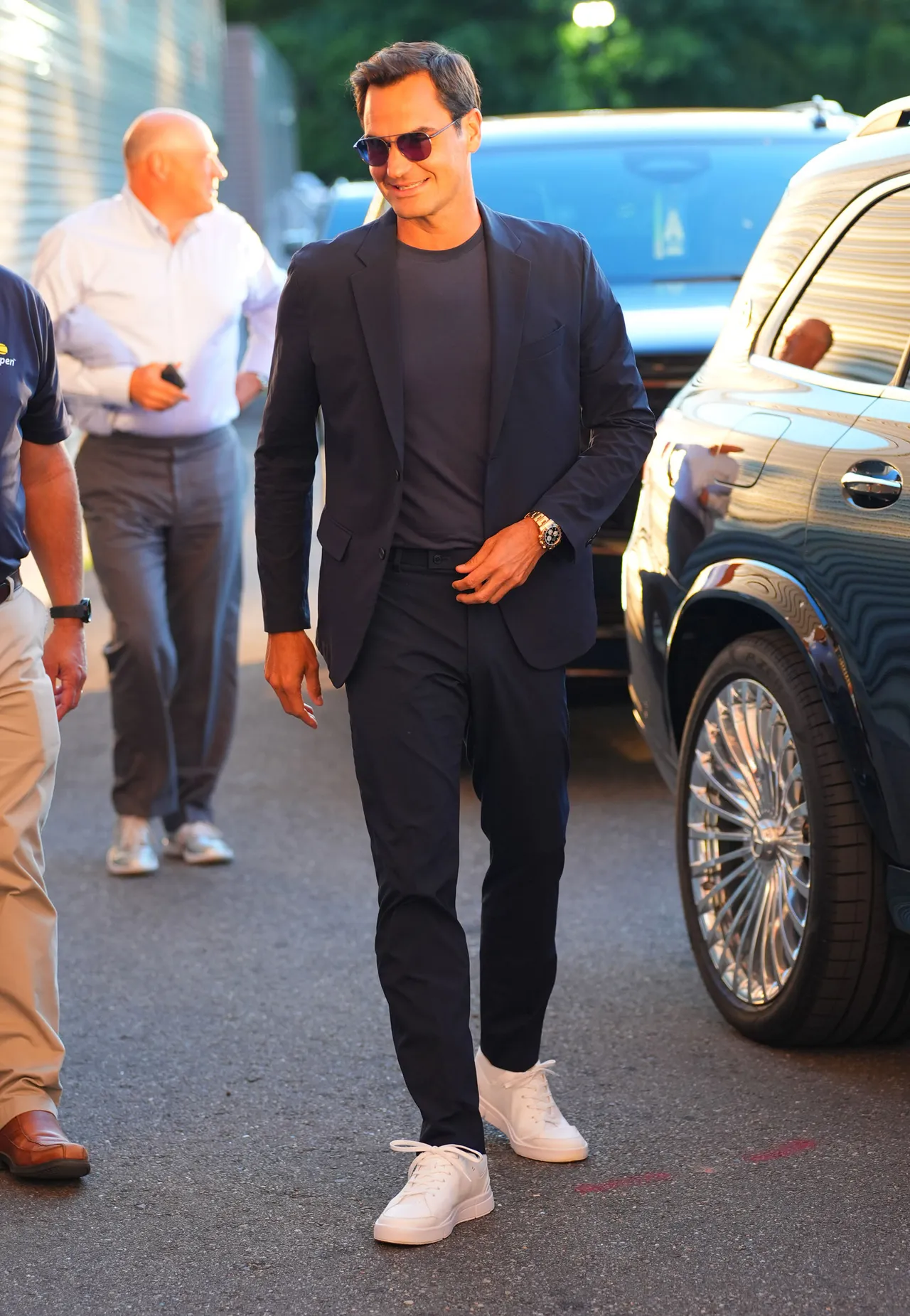 Roger Federer attended the quarter-final matches in a stunning blue suit