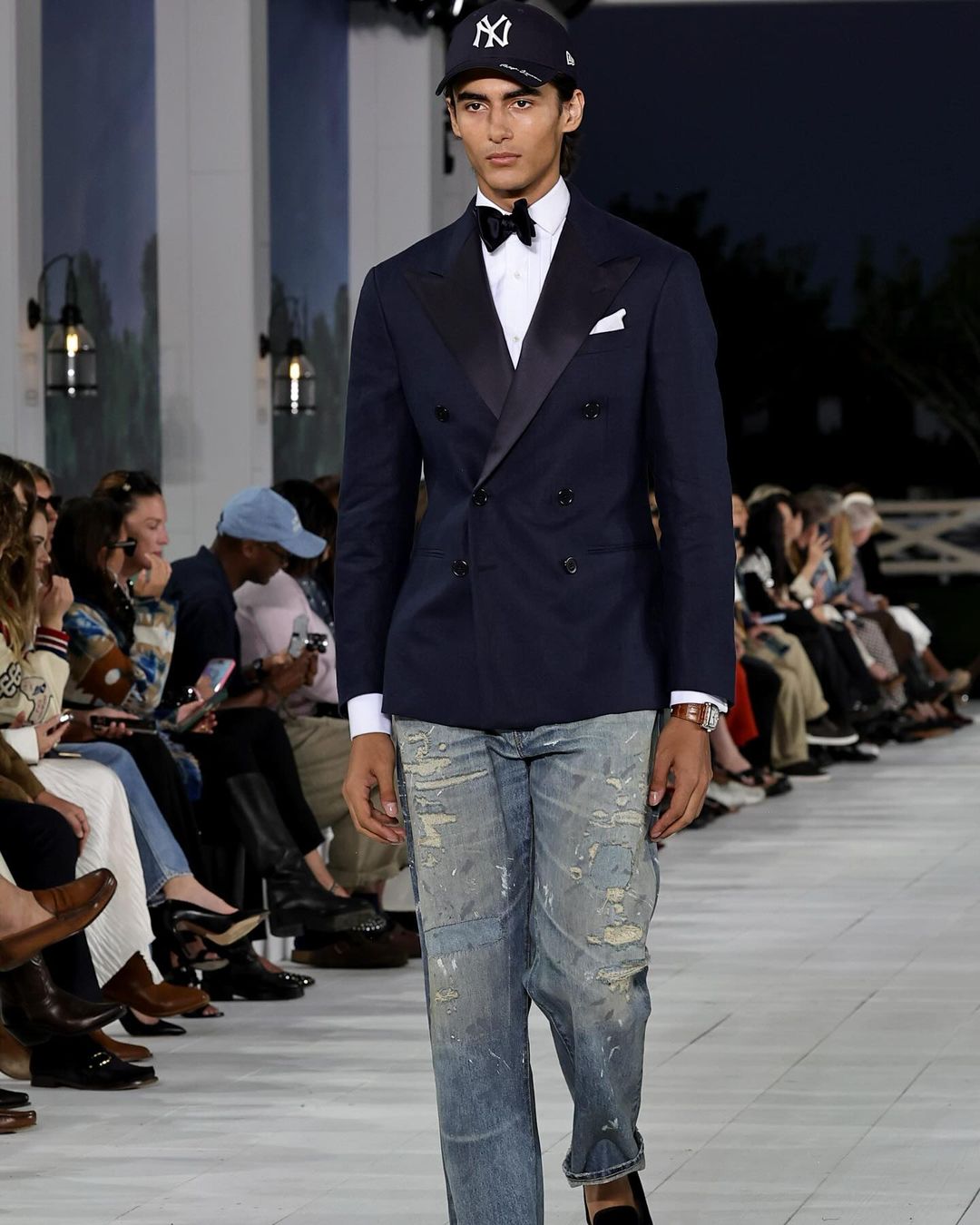 Ralph Lauren's collection reinvented tailored pieces with streetwear elements like oversized silhouettes and jeans.