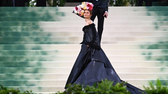 Remember when Zendaya dazzled at the 2024 Met Gala in a brand new John Galliano gown from 1996? It was certainly a moment worth remembering in fashion history. Paired with a headpiece from Alexander McQueen's Spring 2007 collection, her look was nothing short of iconic. (Photo: AFP)