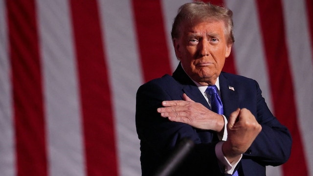 Republican presidential candidate and former U.S. President Donald Trump gestures at the end of his Make America Great Again rally in Latrobe, Pennsylvania, U.S., October 19, 2024. REUTERS/