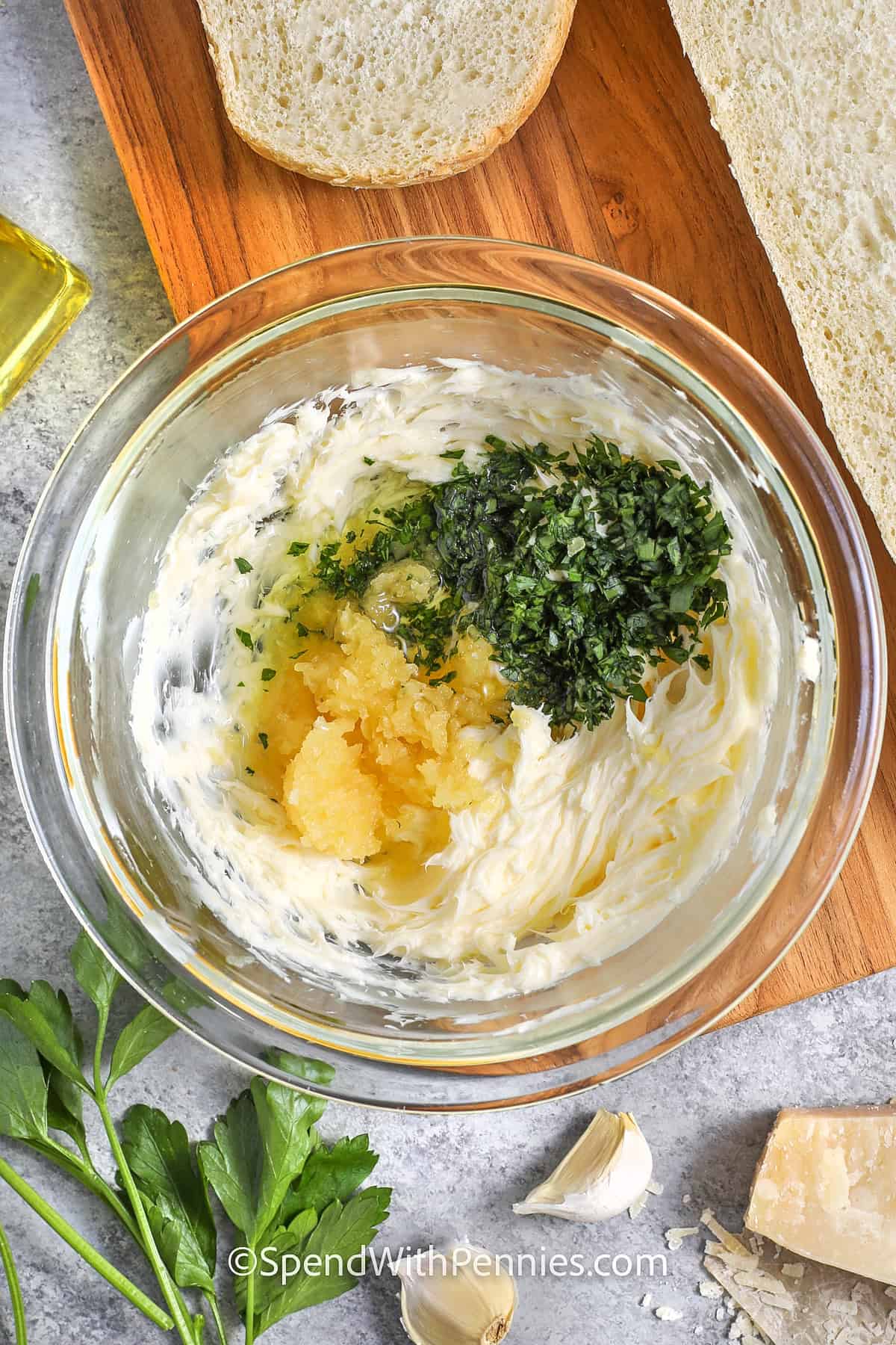 Add garlic and parsley to butter to make homemade garlic bread