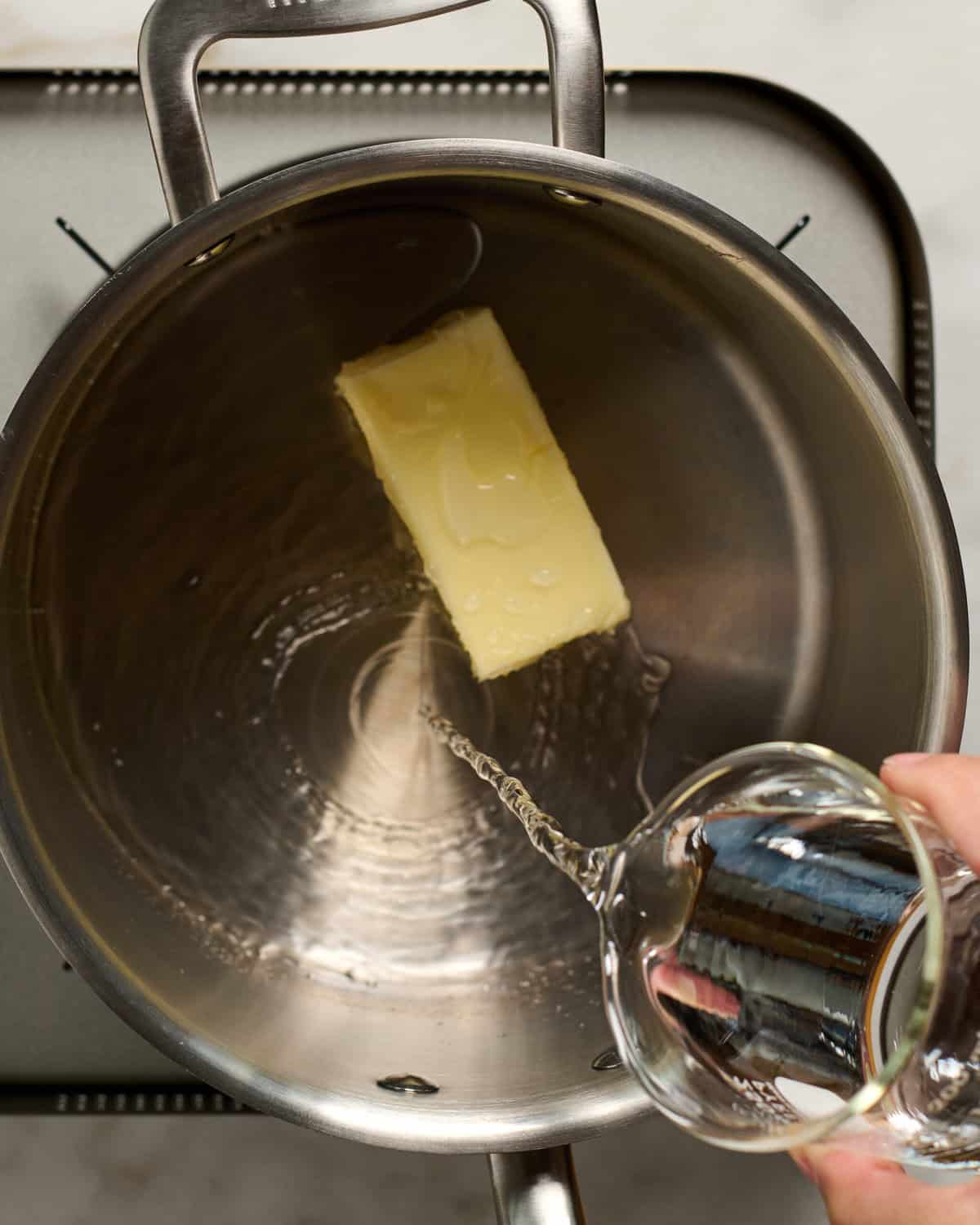 Butter and water are added. 