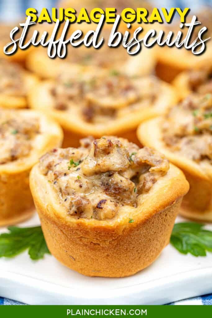 Plate of biscuits filled with sausage gravy and text overlay